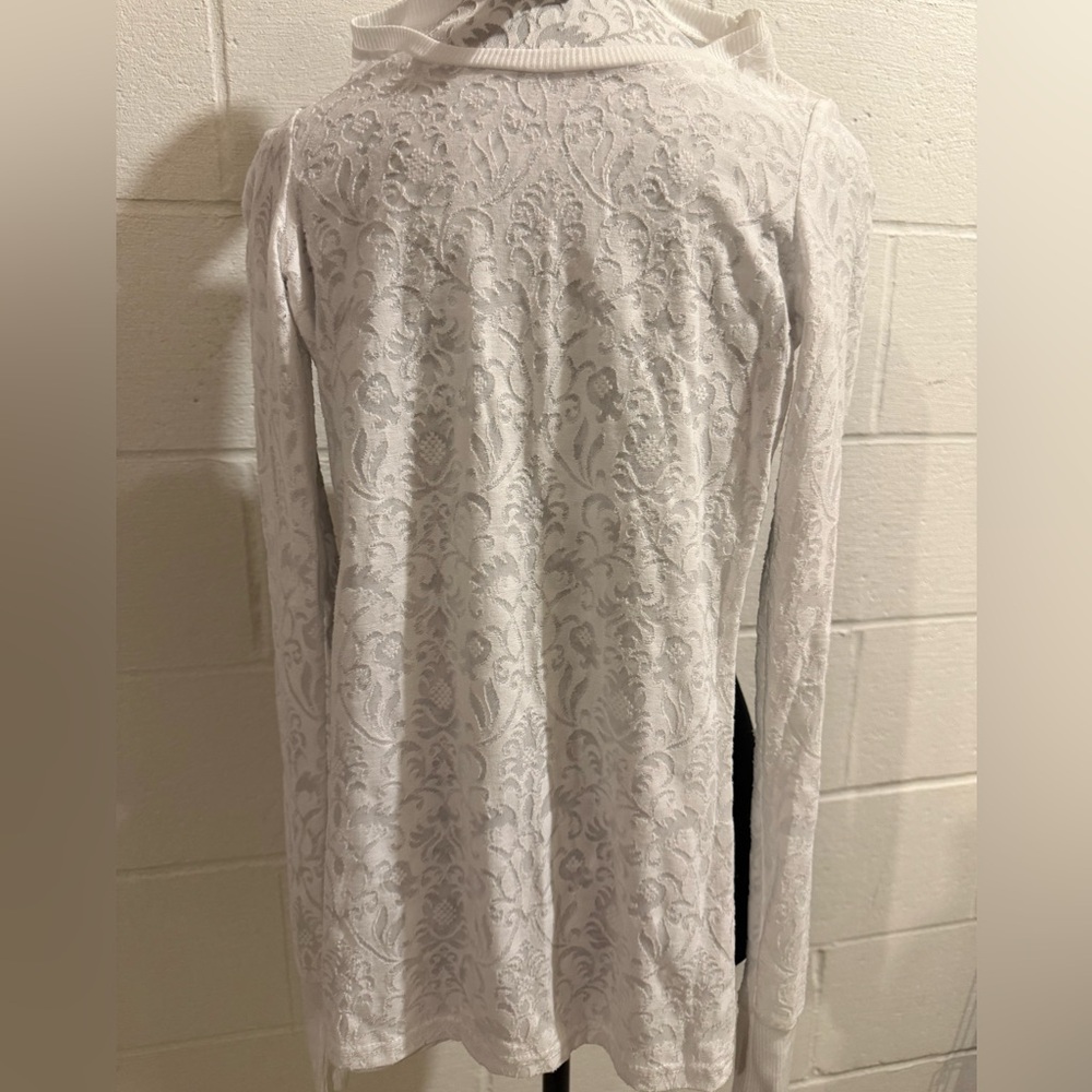 The Buckle long sleeve white lace semi sheer top. Size XS  NWOT